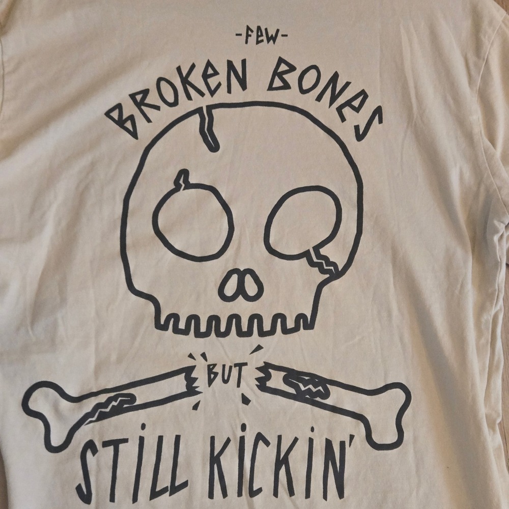 Skate Broken Bones But Still Kickin Skull Graphic T-Shirt Beige Small